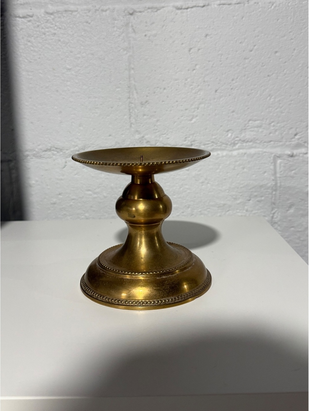 Vintage sturdy brass candle holder